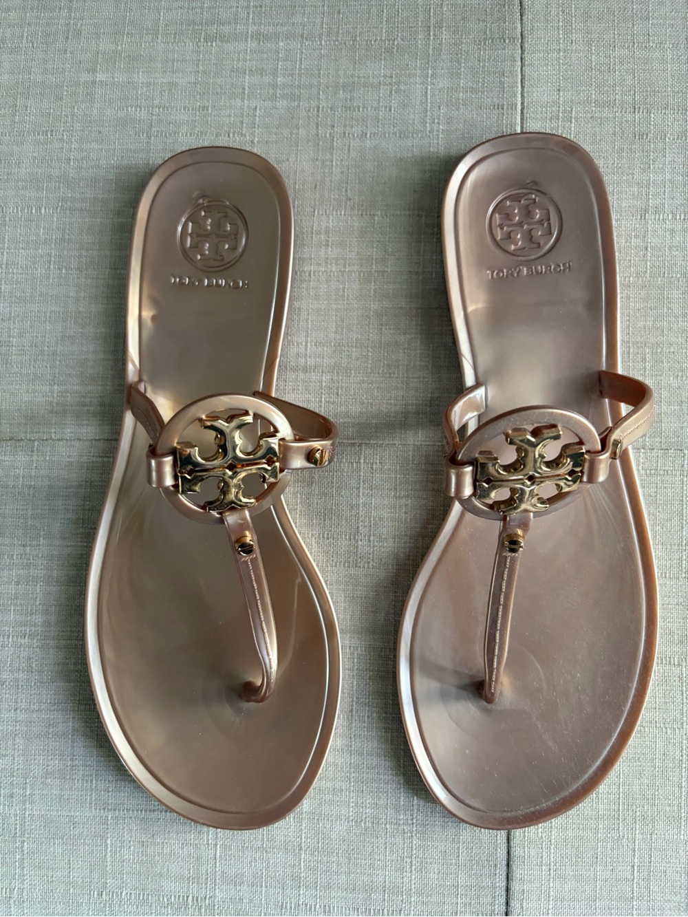 Tory Burch Metallic Rose Gold Logo Jelly Thong Sandals